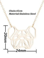 A gold-toned stainless steel pendant necklace with a geometric cat face cutout design, shown on a white background with dimension lines indicating a 24mm width, 20mm height, and a 45cm chain.